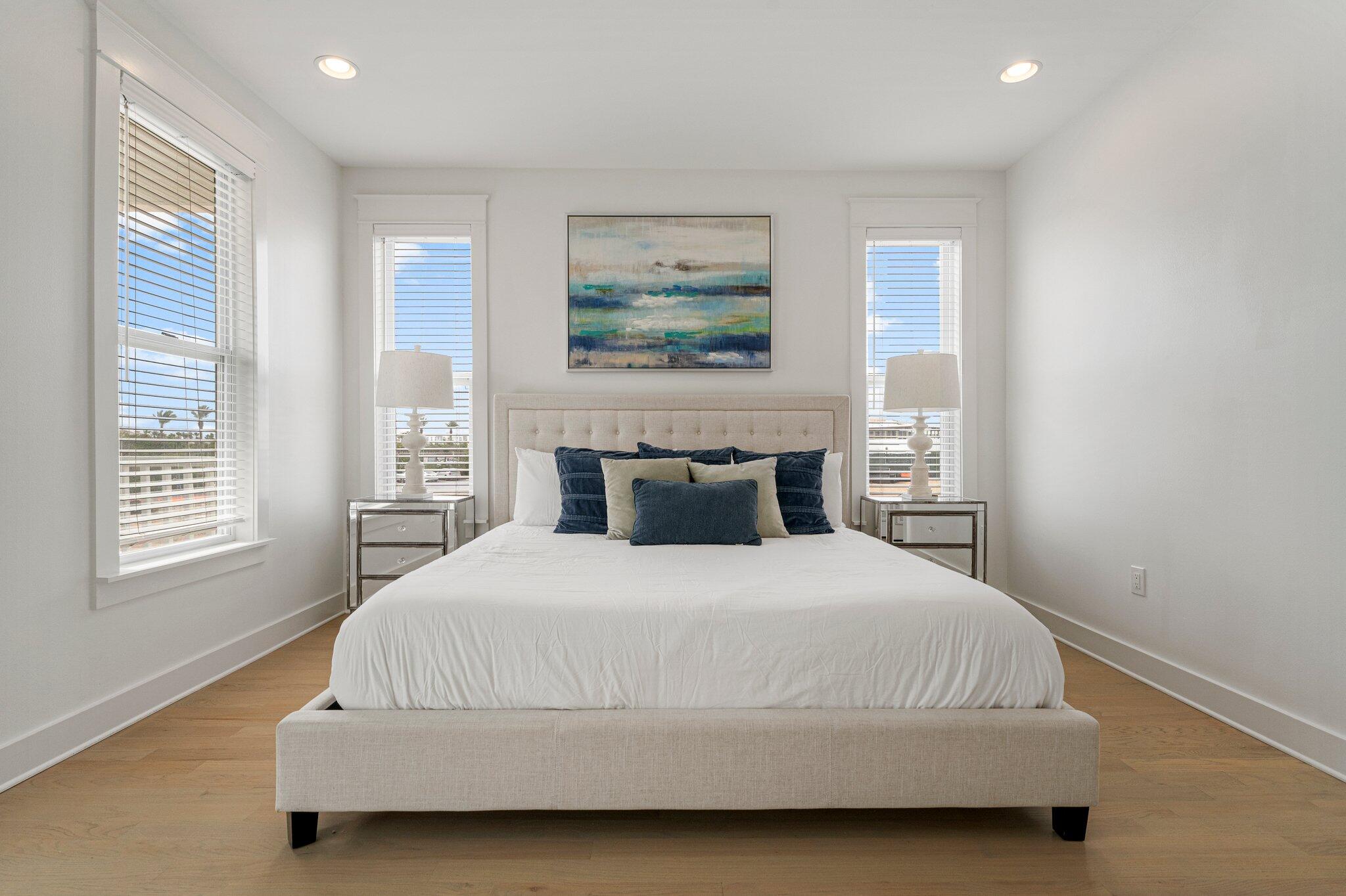 470 Beach Bike Way Inlet Beach, FL 32461 - Photo 31 of 48 a bedroom with a bed and a painting on the wall