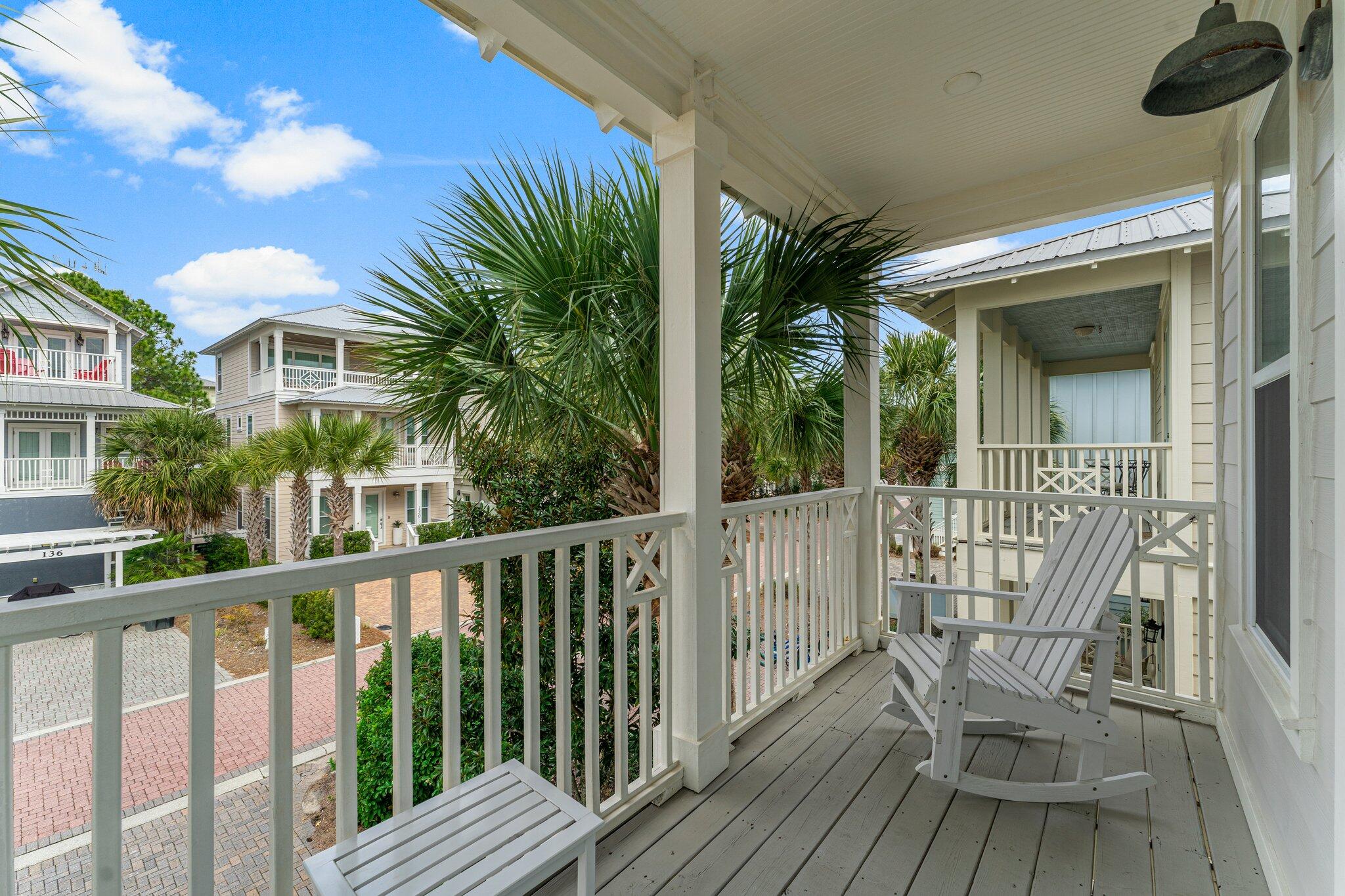 470 Beach Bike Way Inlet Beach, FL 32461 - Photo 4 of 48 a view of a chair and table in the balcony