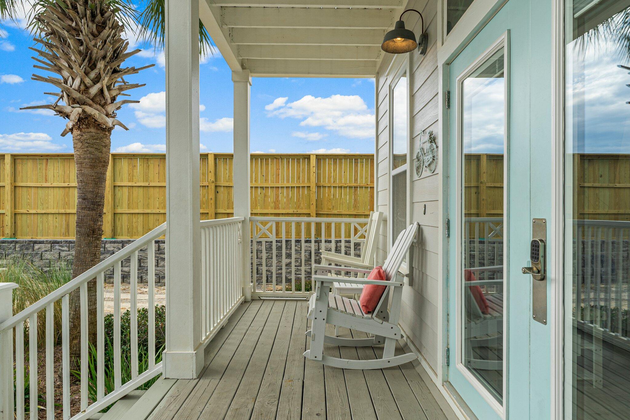 470 Beach Bike Way Inlet Beach, FL 32461 - Photo 46 of 48 a view of a balcony with wooden floor and iron fence