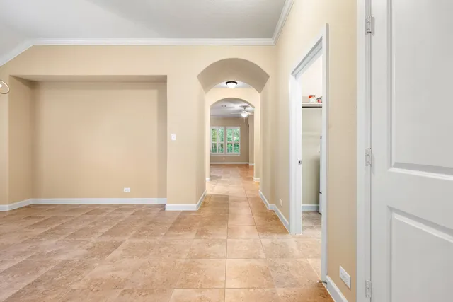 a view of a kitchen with a stove and a kitchen island