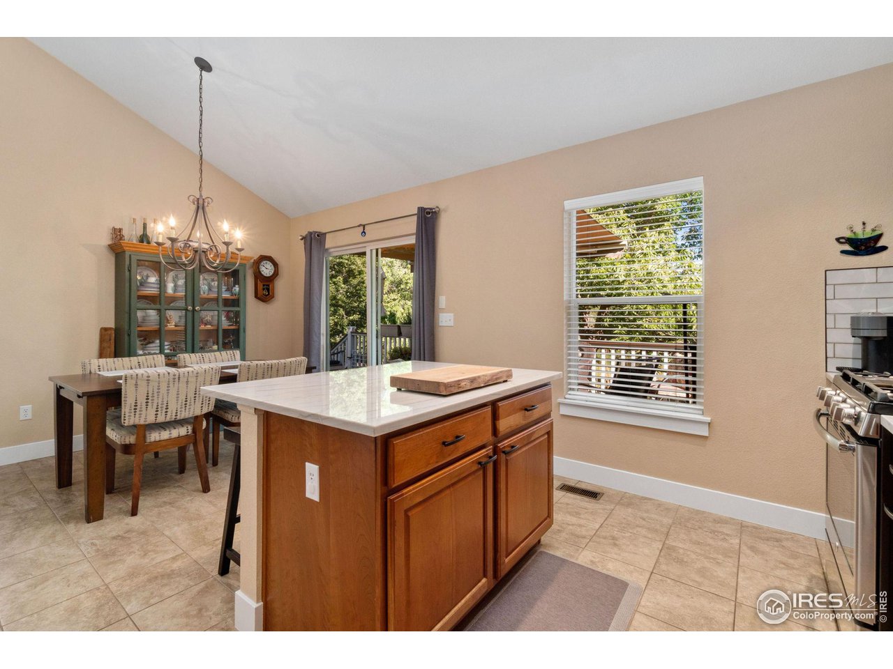 2425 Windrow Lane Lafayette, CO 80026 - Photo 17 of 35 a kitchen that has a sink a window and a counter top space