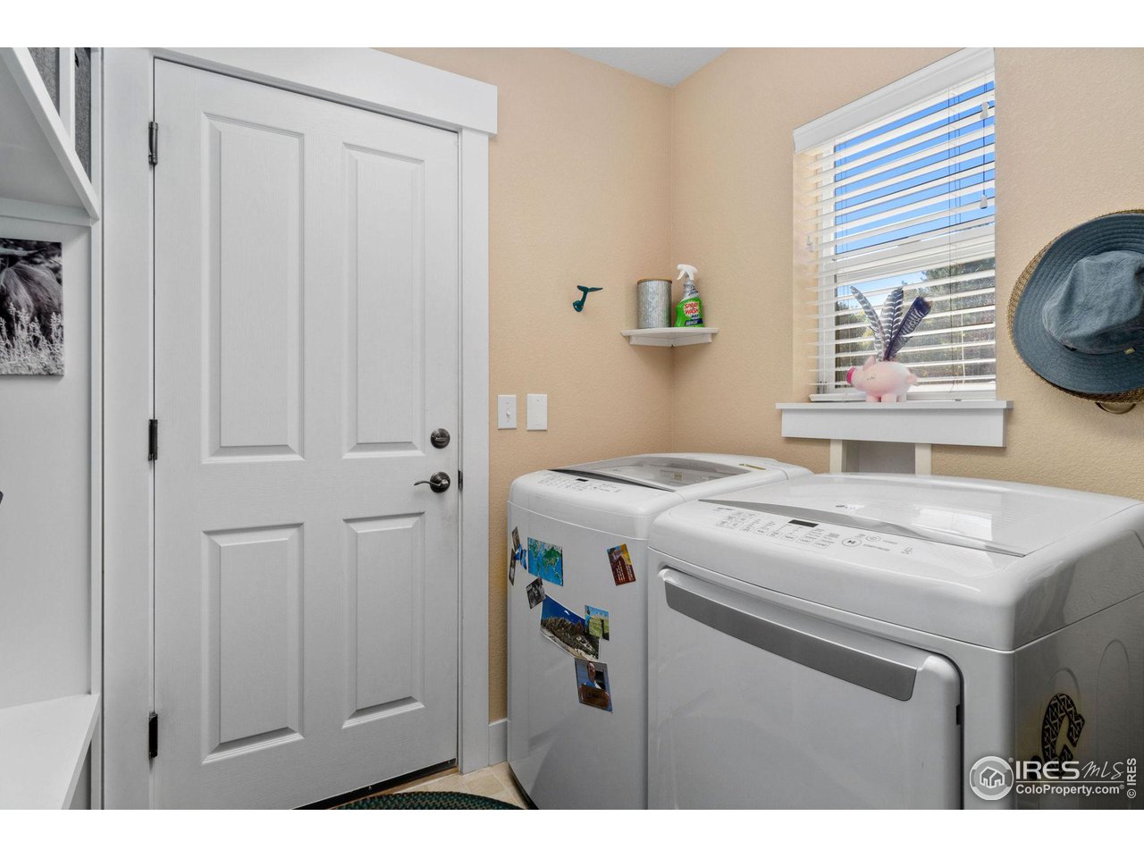 2425 Windrow Lane Lafayette, CO 80026 - Photo 20 of 35 a utility room with dryer and washer
