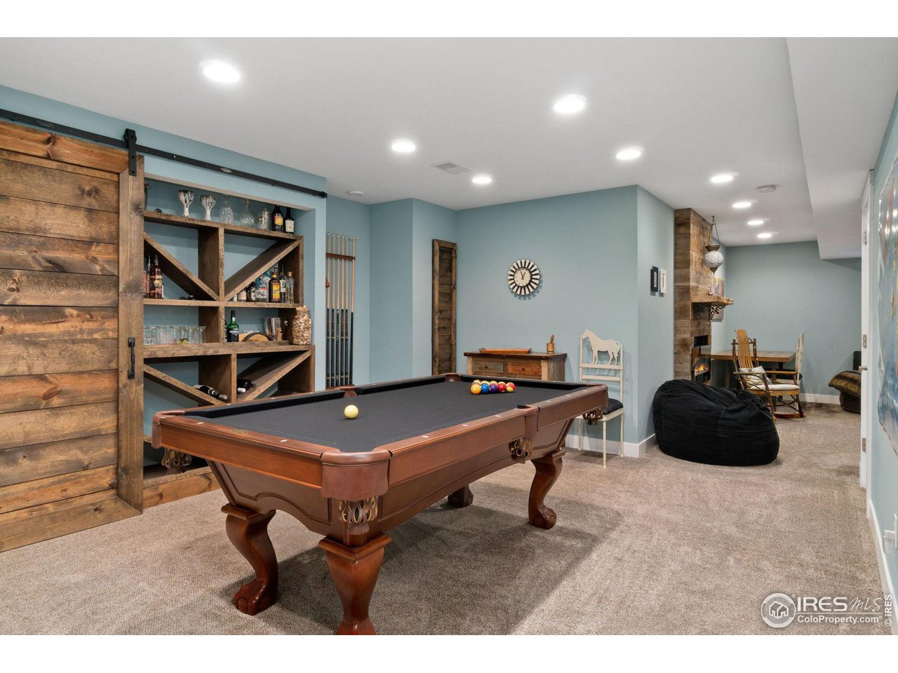 2425 Windrow Lane Lafayette, CO 80026 - Photo 26 of 35 a room with furniture and a table