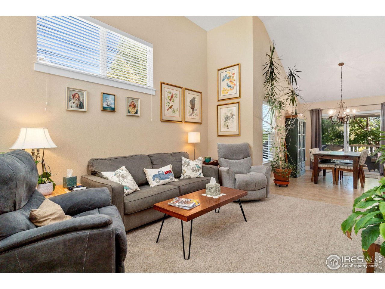 2425 Windrow Lane Lafayette, CO 80026 - Photo 7 of 35 a living room with furniture and a large window