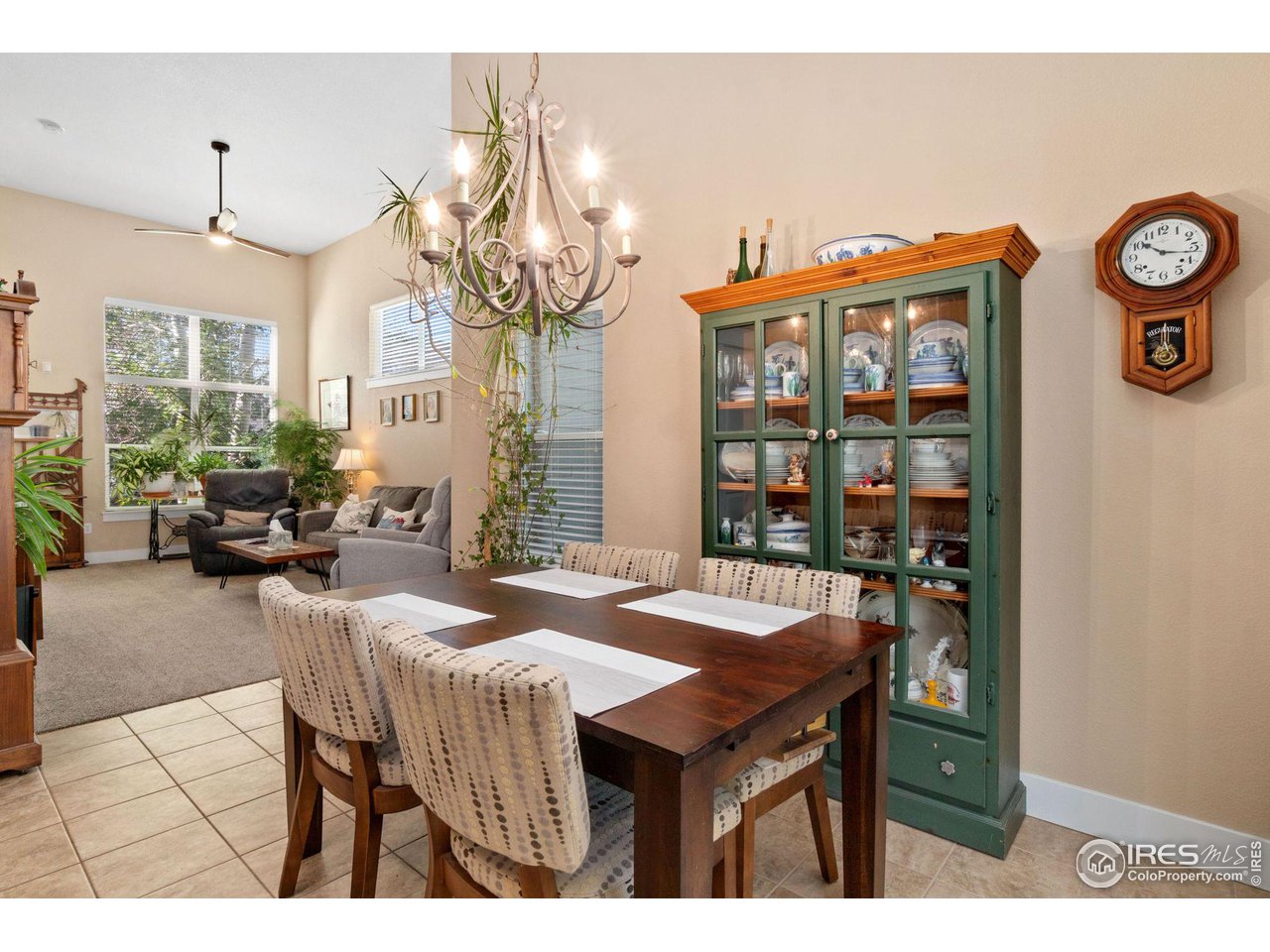 2425 Windrow Lane Lafayette, CO 80026 - Photo 9 of 35 a dinning table and chairs in a room