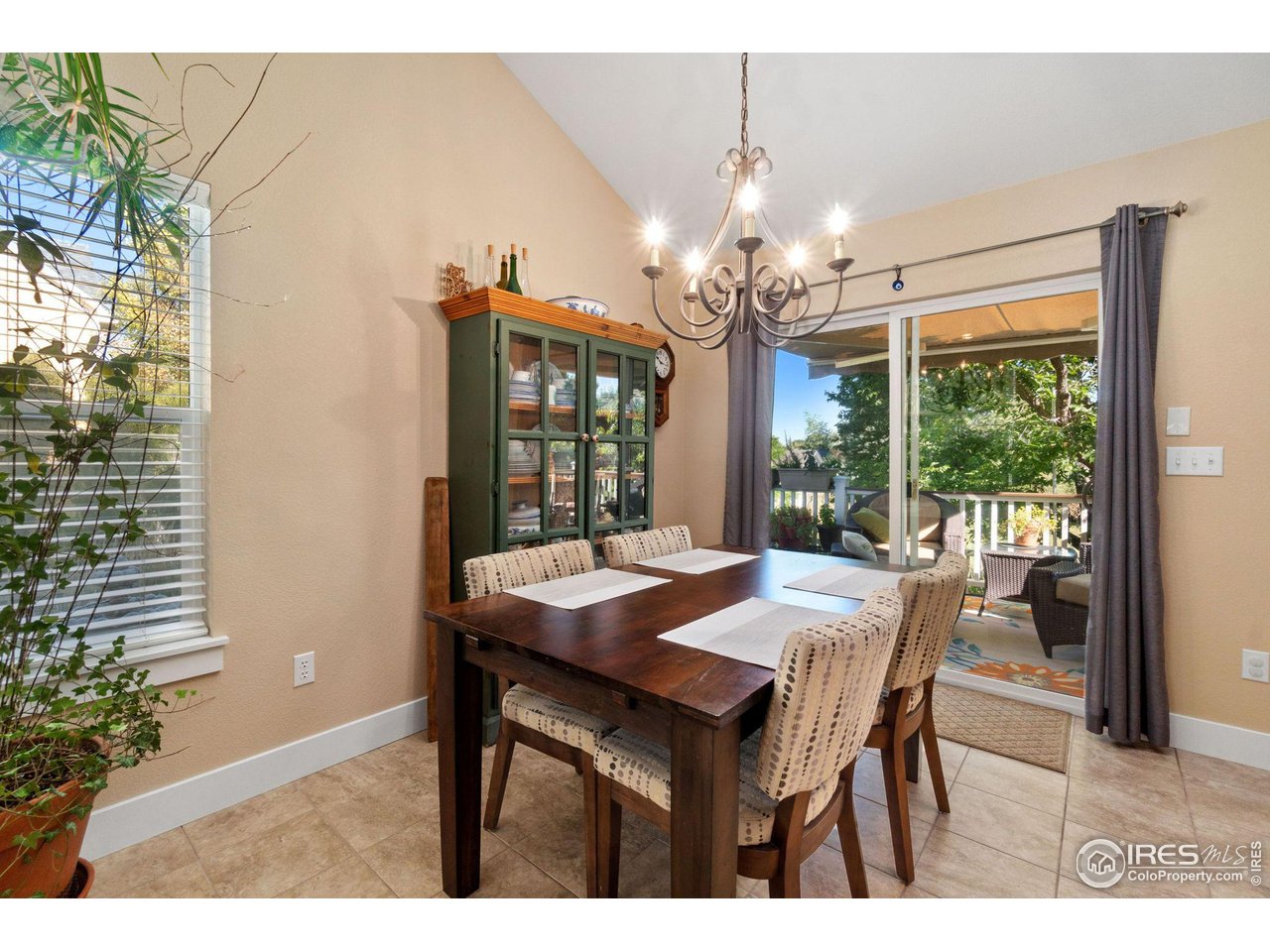 2425 Windrow Lane Lafayette, CO 80026 - Photo 10 of 35 a view of a dining room with furniture window and outside view
