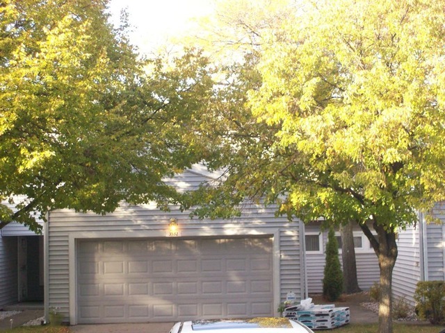 3532 Golfview Drive Hazel Crest, IL 60429 - Photo 1 of 5 a front view of a house with a tree