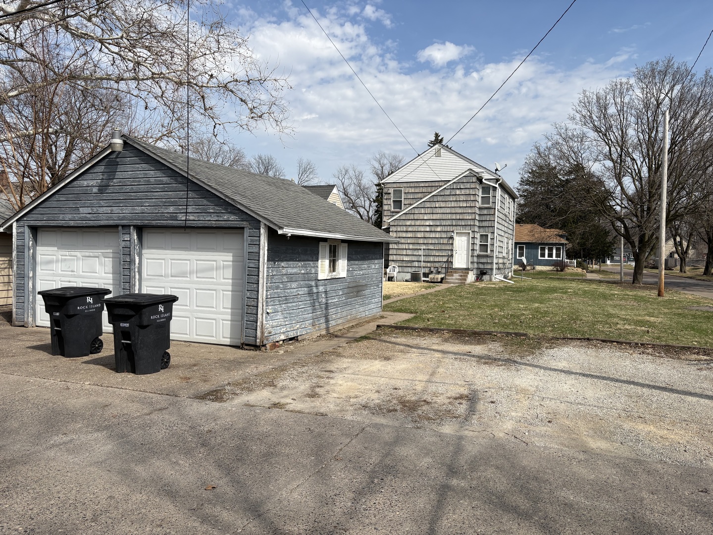 1444 43rd Street Rock Island, IL 61201 - Photo 4 of 4 a view of a house with a yard