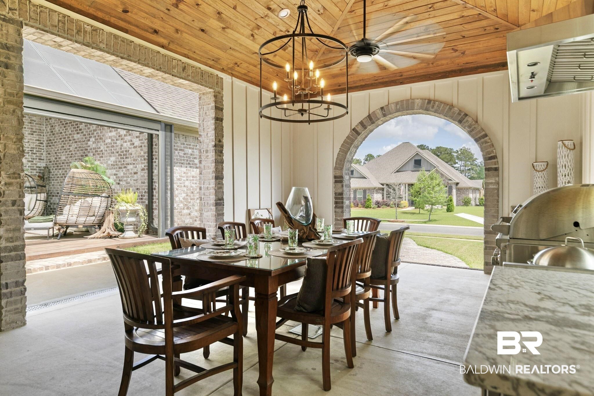 291 Hemlock Drive Fairhope, AL 36532 - Photo 53 of 65 Dining area with wood ceiling, suspended lighting, and arched walkways