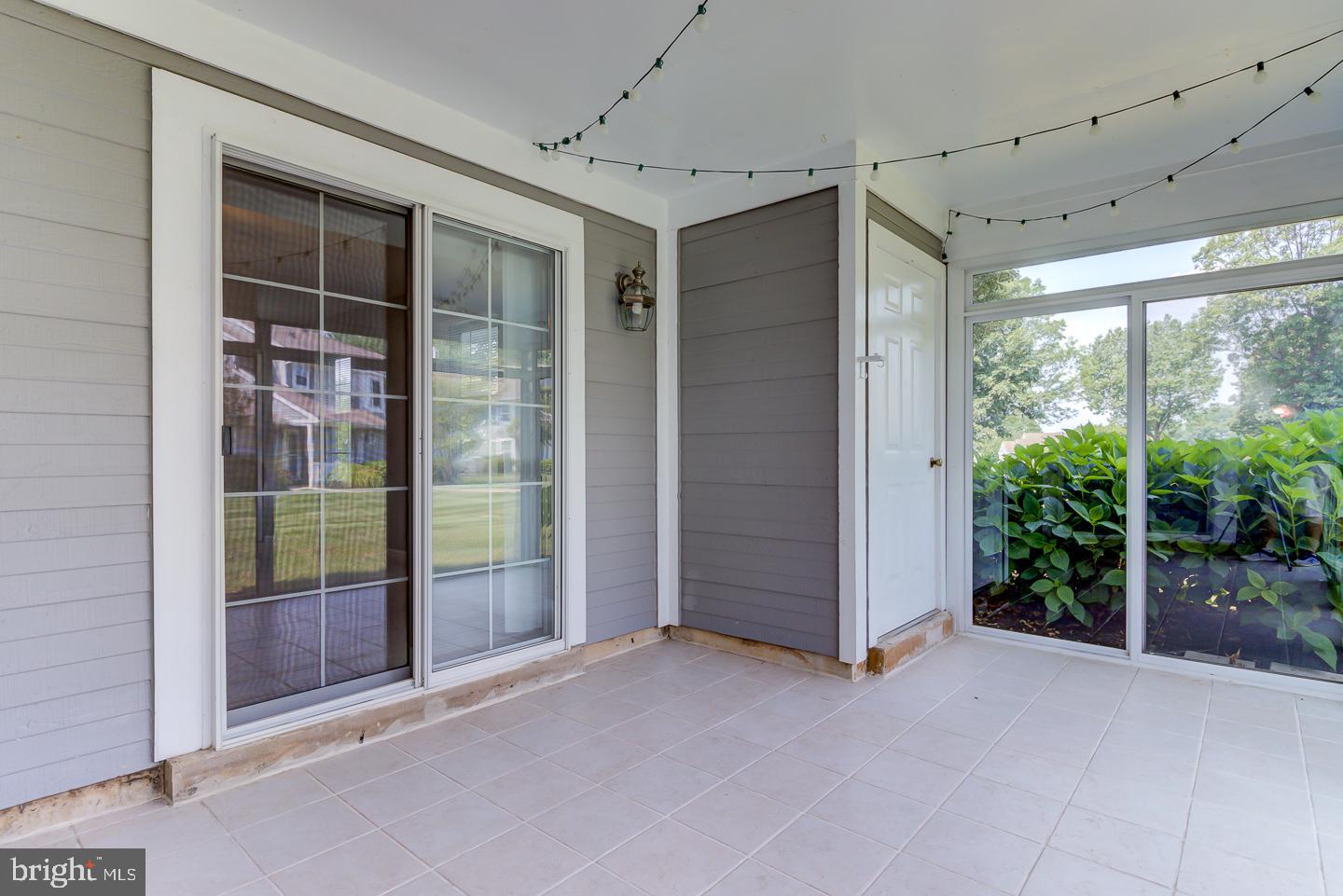 331 McIntosh Road West Chester, PA 19382 - Photo 22 of 26 3 Season Sun Room with tile floor & storage closet