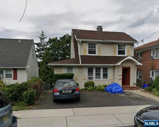 250 Ridgefield Avenue, Unit 2 Bogota, NJ 07603 - Photo 1 of 9 a front view of a house with a yard