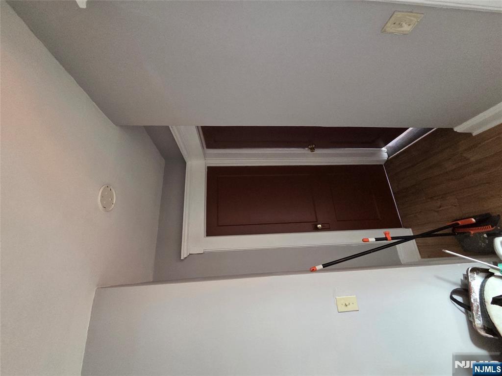 250 Ridgefield Avenue, Unit 2 Bogota, NJ 07603 - Photo 6 of 9 a view of a room with wooden floor