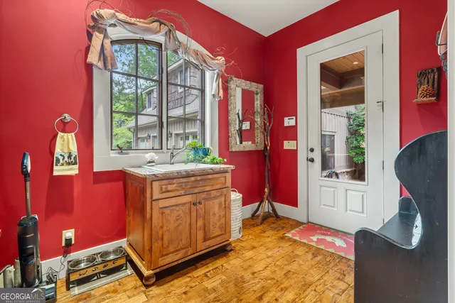a spacious bedroom with a bed and window