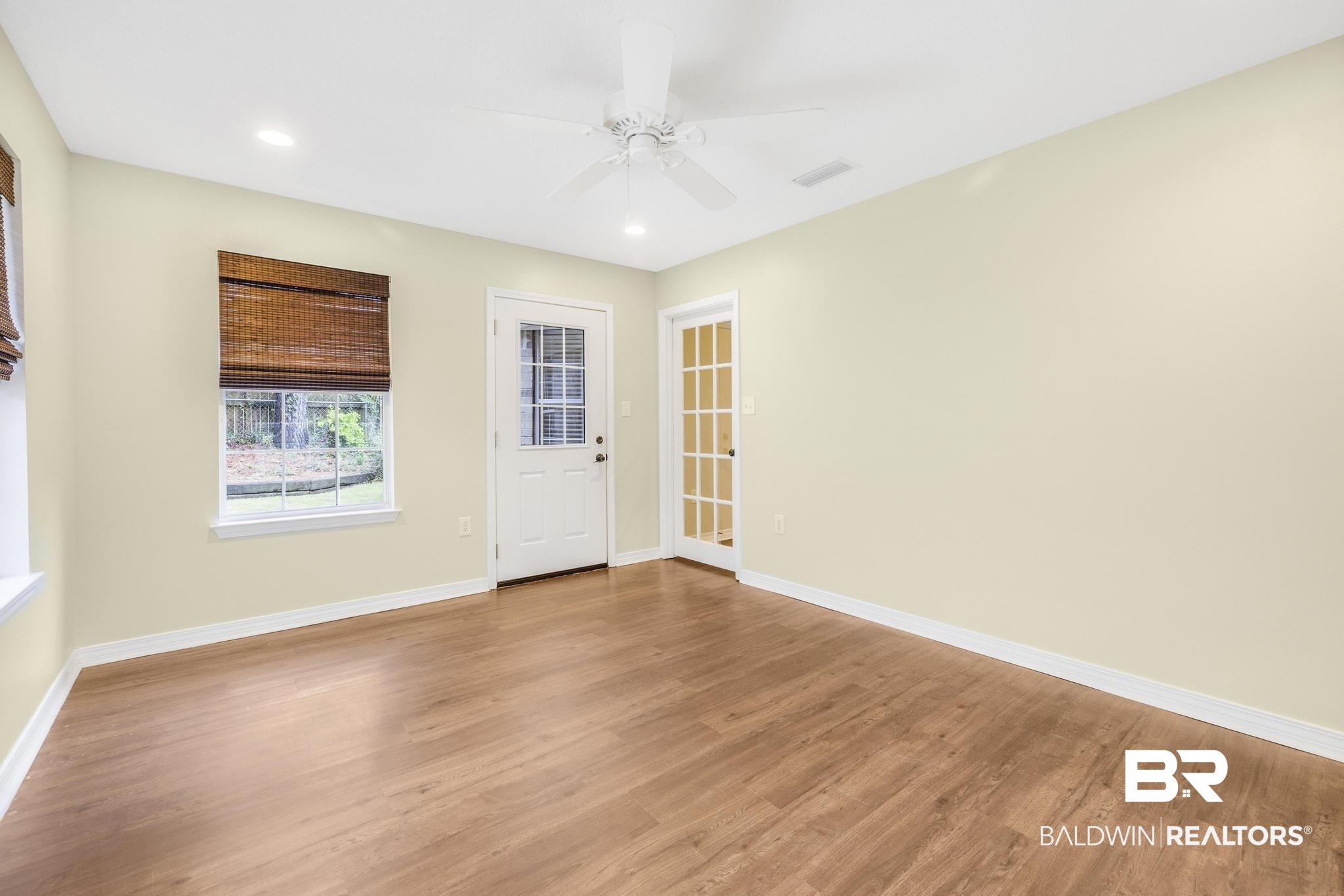140 Hope Drive Daphne, AL 36526 - Photo 20 of 54 Unfurnished room with light wood-type flooring, recessed lighting, and a ceiling fan