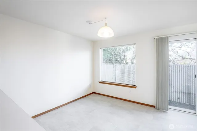 a kitchen with stainless steel appliances a sink a stove and a window