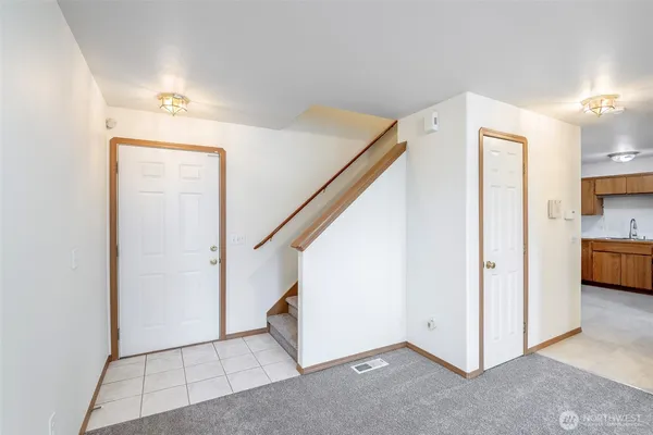 a view of a room with storage and utility room