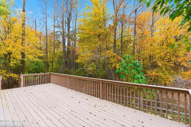 a view of balcony with wooden floor