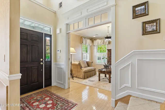 a living room with furniture and a rug