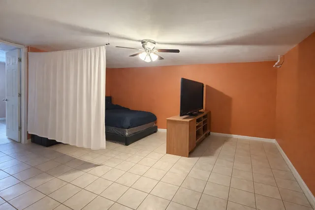 a view of a livingroom with a furniture