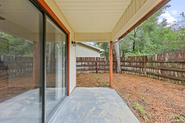 a view of backyard with green space