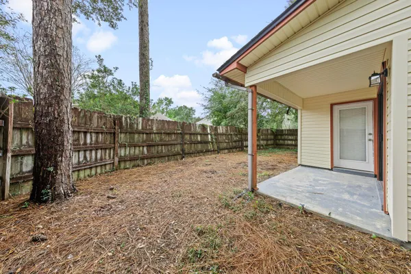 a view of backyard with green space