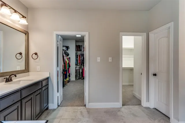 a view of a sink and a mirror