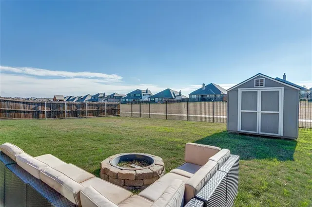 a view of a house with a big yard
