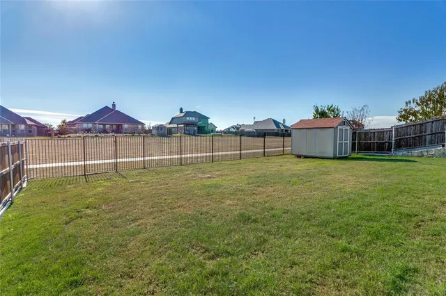 a view of a garden with a houses