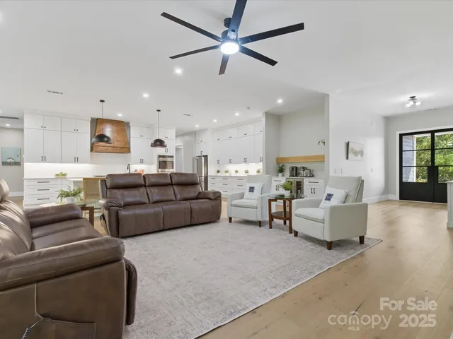 a kitchen with cabinets and window