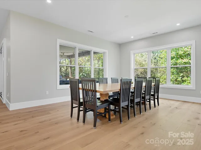 a spacious bedroom with a bed and window