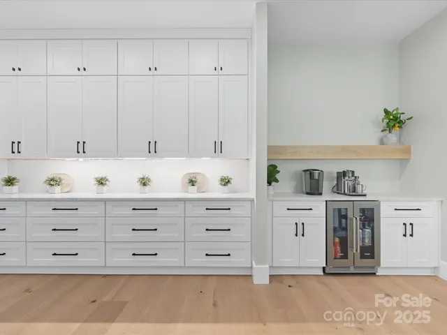 a room with a chair and a window