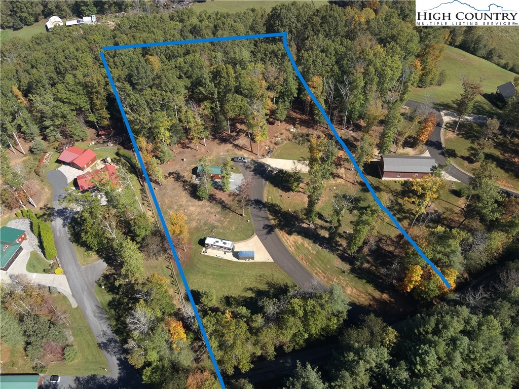 2410 Mt Carmel Road Sparta, NC 28675 - Photo 13 of 13 an aerial view of residential houses with outdoor space