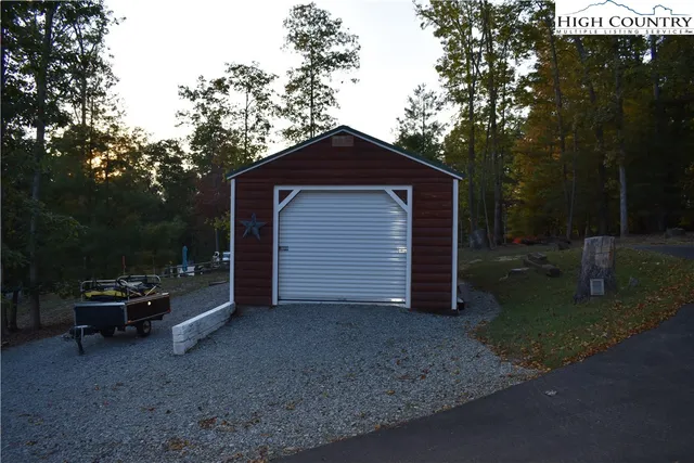 a view of backyard with entertaining space
