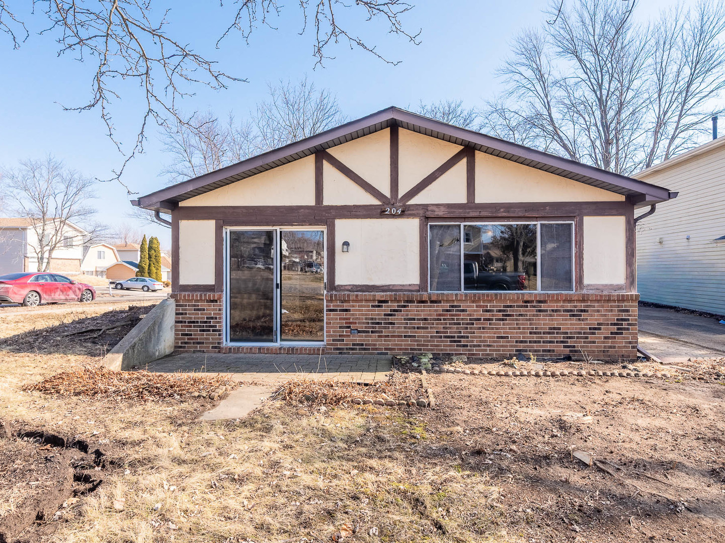 204 Mill Stream Drive Bolingbrook, IL 60440 - Photo 2 of 9 a front view of a house with garden