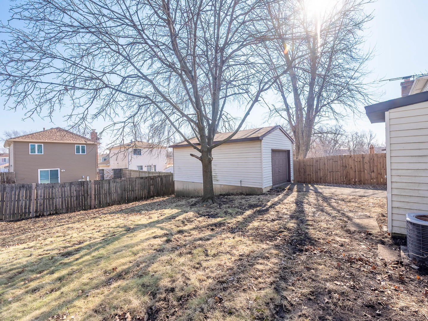 204 Mill Stream Drive Bolingbrook, IL 60440 - Photo 8 of 9 a view of a yard covered in snow