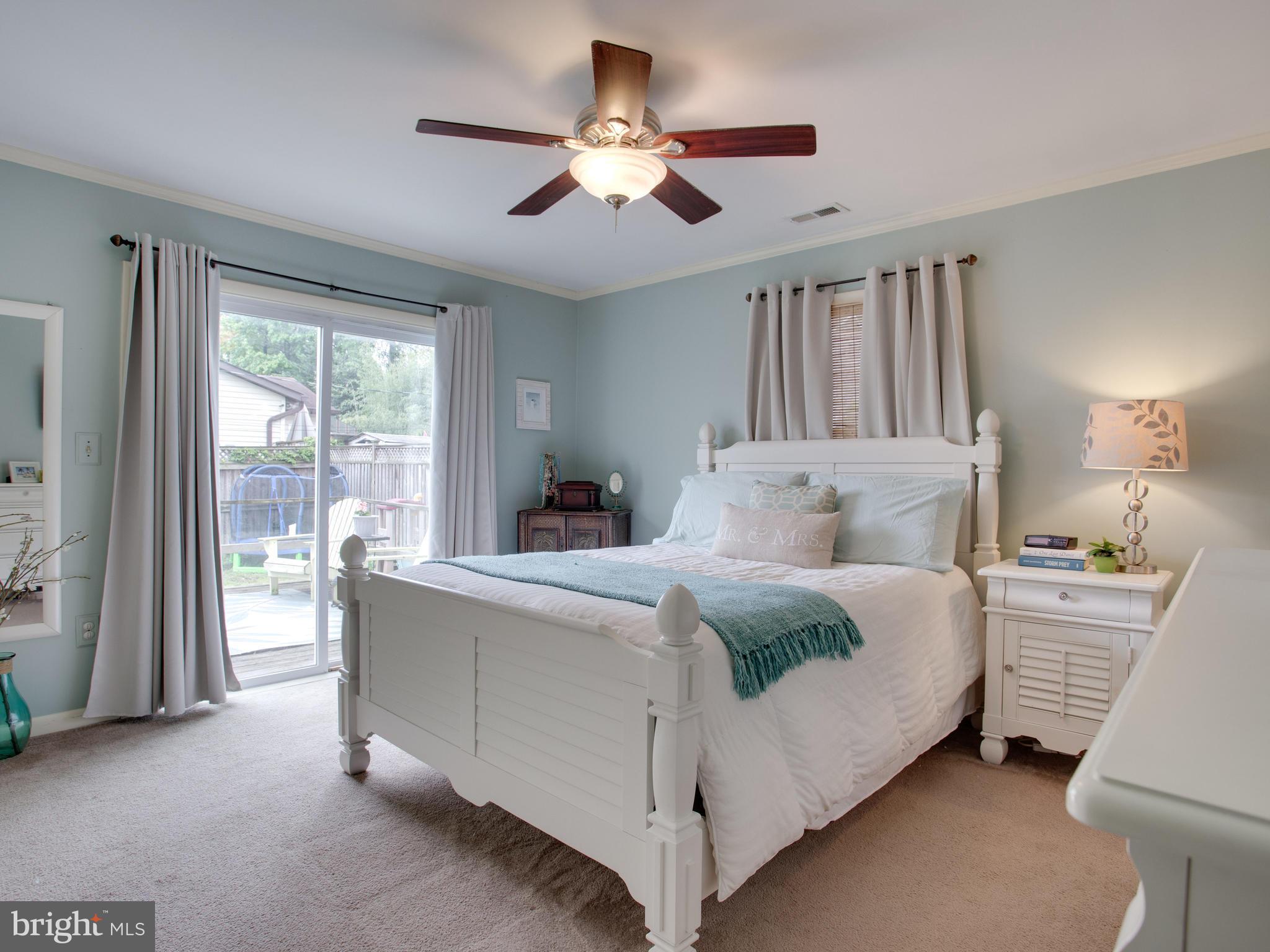 1701 Potomac Road Edgewater, MD 21037 - Photo 14 of 30 a bed room with a bed and a large window