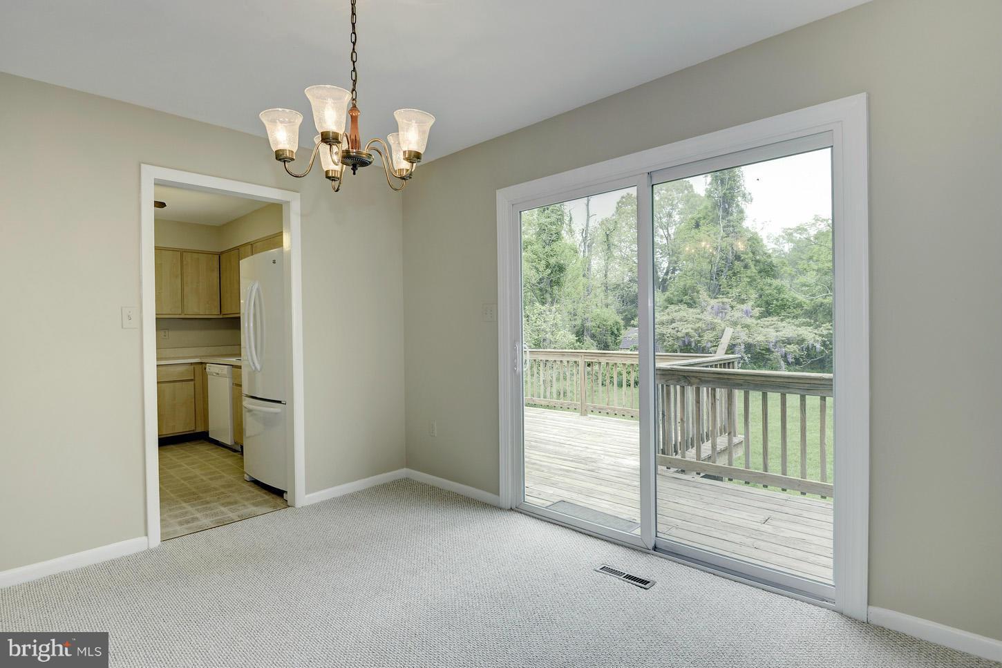 16110 Accolawn Road Accokeek, MD 20607 - Photo 5 of 20 a view of a room with a windows and ceiling fan