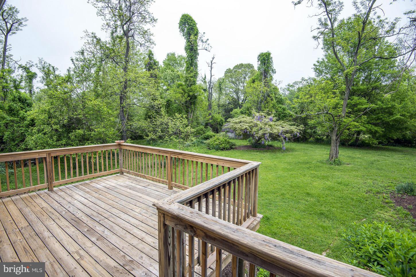 16110 Accolawn Road Accokeek, MD 20607 - Photo 6 of 20 a view of balcony with deck and trees