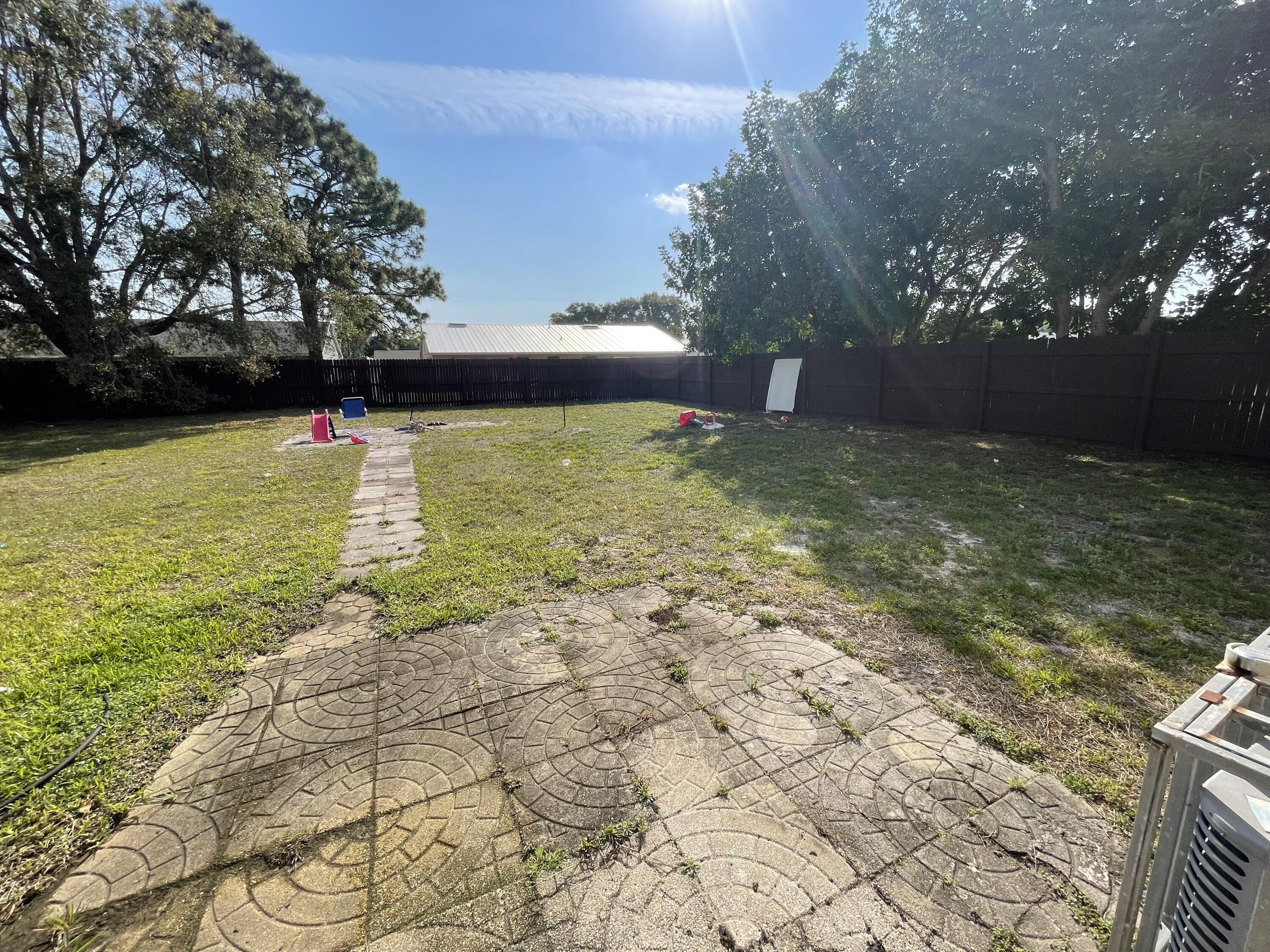 2880 Harson Way Fort Pierce, FL 34946 - Photo 39 of 40 a view of yard with swimming pool