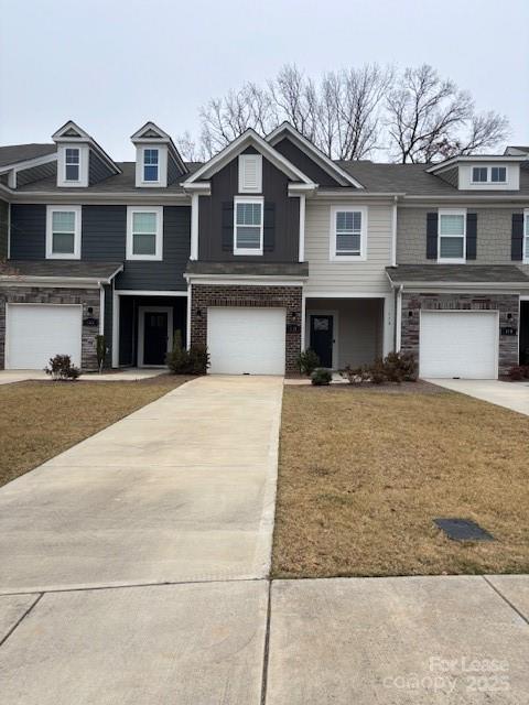 118 Quinn Road Matthews, NC 28104 - Photo 1 of 29 a view of a white house with large windows