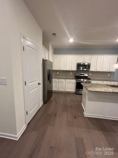 118 Quinn Road Matthews, NC 28104 - Photo 29 of 29 a kitchen with stainless steel appliances a refrigerator stove and sink