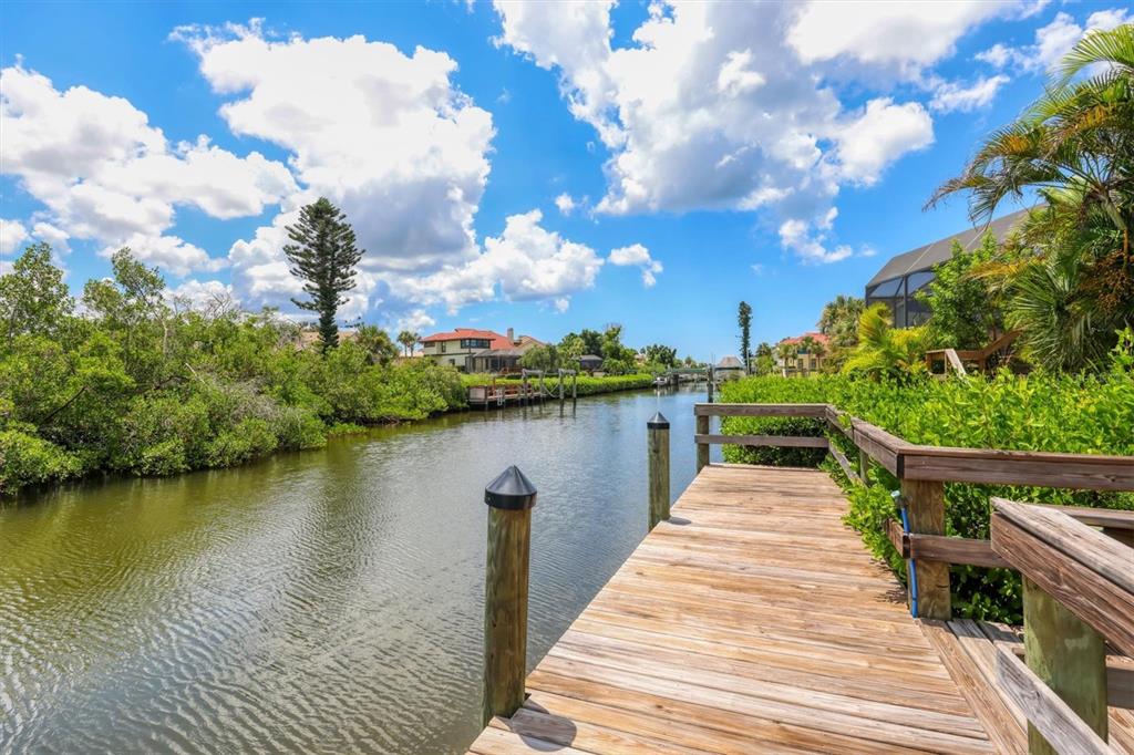 133 Inlets Boulevard, Unit 133 Nokomis, FL 34275 - Photo 35 of 63 a park view with a lake view