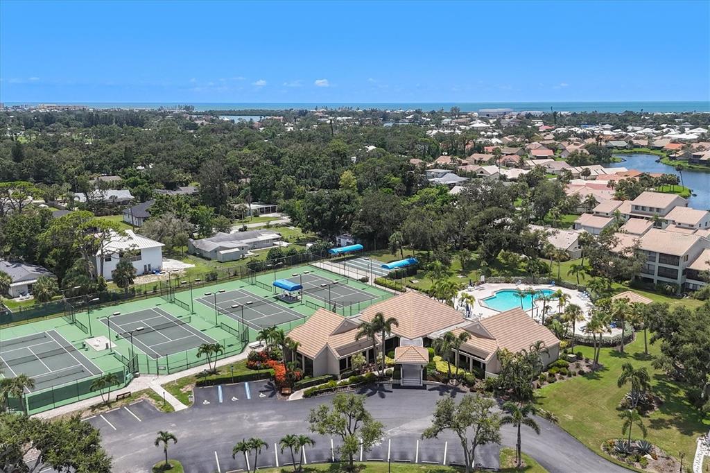 133 Inlets Boulevard, Unit 133 Nokomis, FL 34275 - Photo 57 of 63 an aerial view of residential houses with outdoor space and river