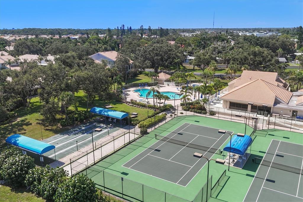 133 Inlets Boulevard, Unit 133 Nokomis, FL 34275 - Photo 58 of 63 an aerial view of a house with a garden