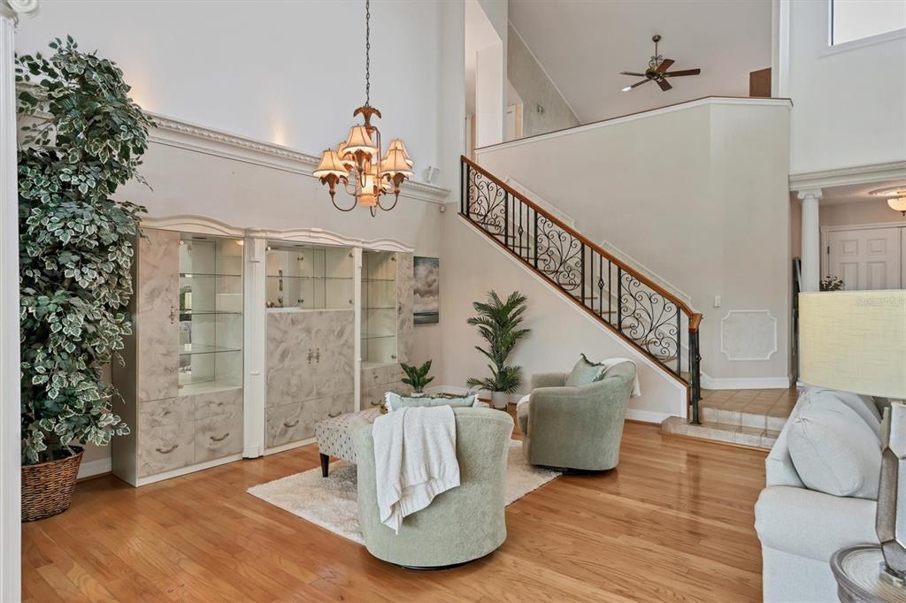 133 Inlets Boulevard, Unit 133 Nokomis, FL 34275 - Photo 9 of 63 a view of entryway and hall with wooden floor