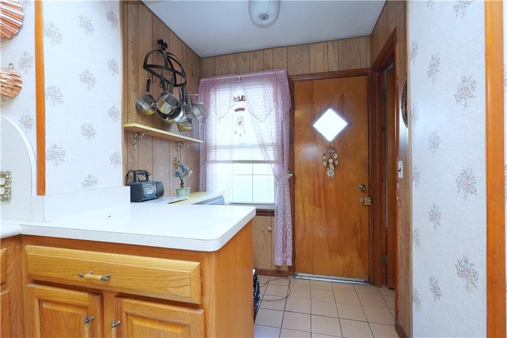 649 Bay Ridge Parkway Brooklyn, NY 11209 - Photo 14 of 29 a bathroom with a sink and a mirror