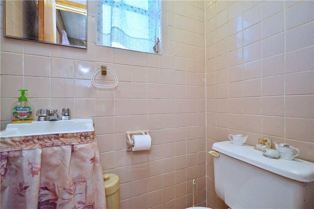 649 Bay Ridge Parkway Brooklyn, NY 11209 - Photo 15 of 29 a bathroom with a bathtub and sink