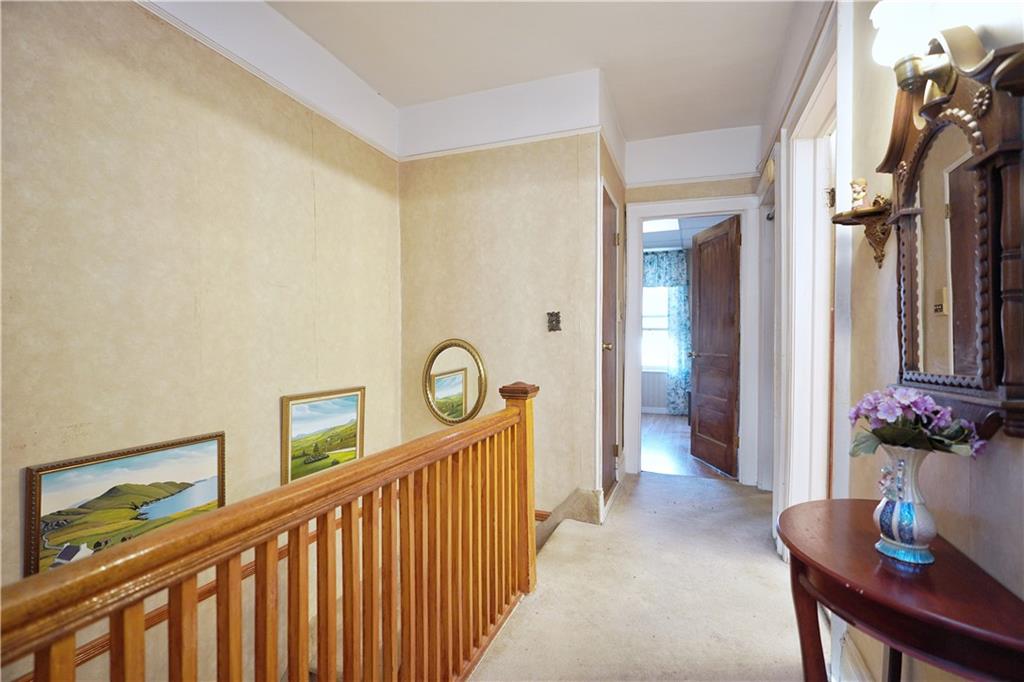 649 Bay Ridge Parkway Brooklyn, NY 11209 - Photo 16 of 29 a view of a hallway to a livingroom with furniture