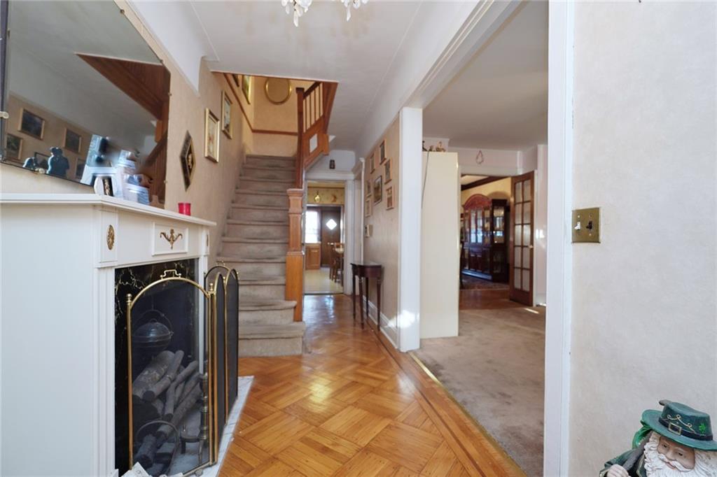 649 Bay Ridge Parkway Brooklyn, NY 11209 - Photo 5 of 29 a view of a hallway with washer and dryer