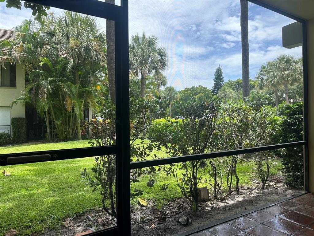 159 Northwest 70th Street, Unit 517 Boca Raton, FL 33487 - Photo 27 of 30 a view of outdoor with green space